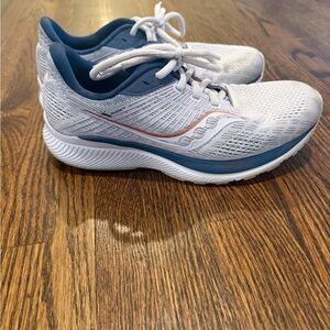 Saucony Women's Athletic Shoes in navy blue and lavender.